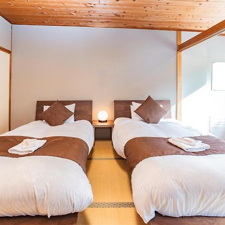 Nomad Hakuba Bed & Breakfast Exterior photo