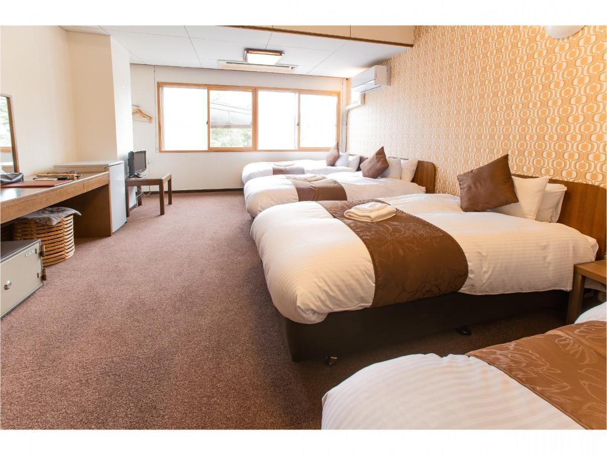 Nomad Hakuba Bed & Breakfast Exterior photo
