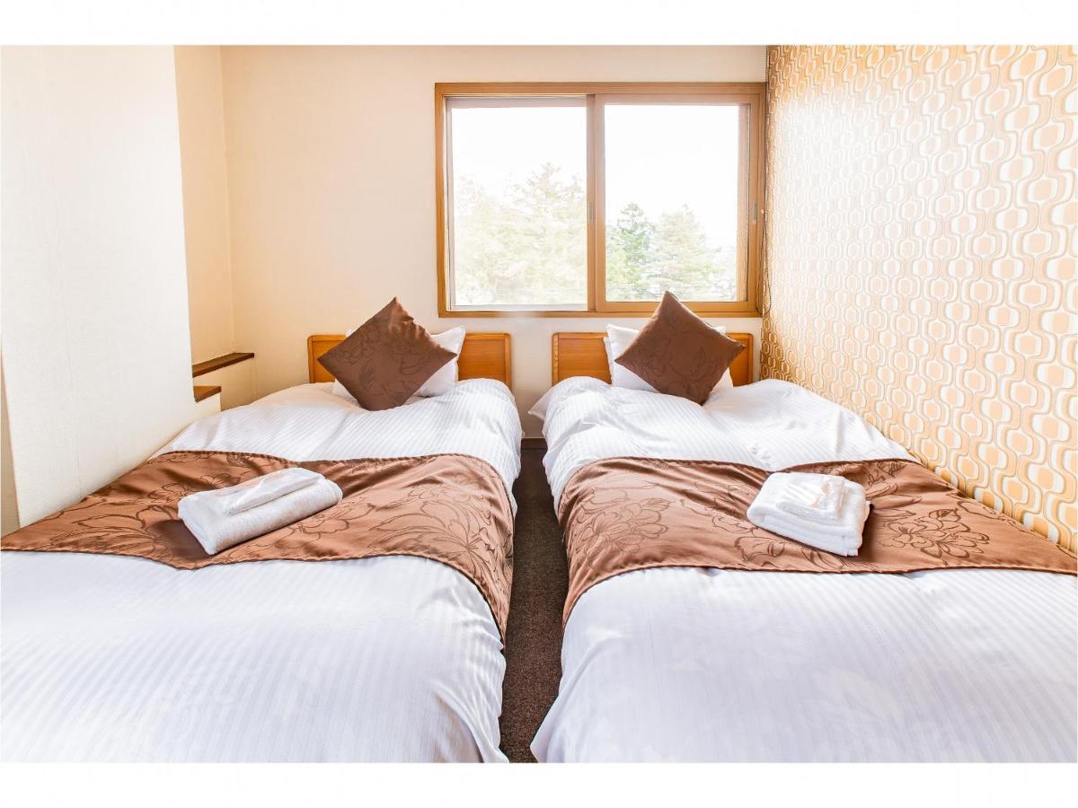 Nomad Hakuba Bed & Breakfast Exterior photo