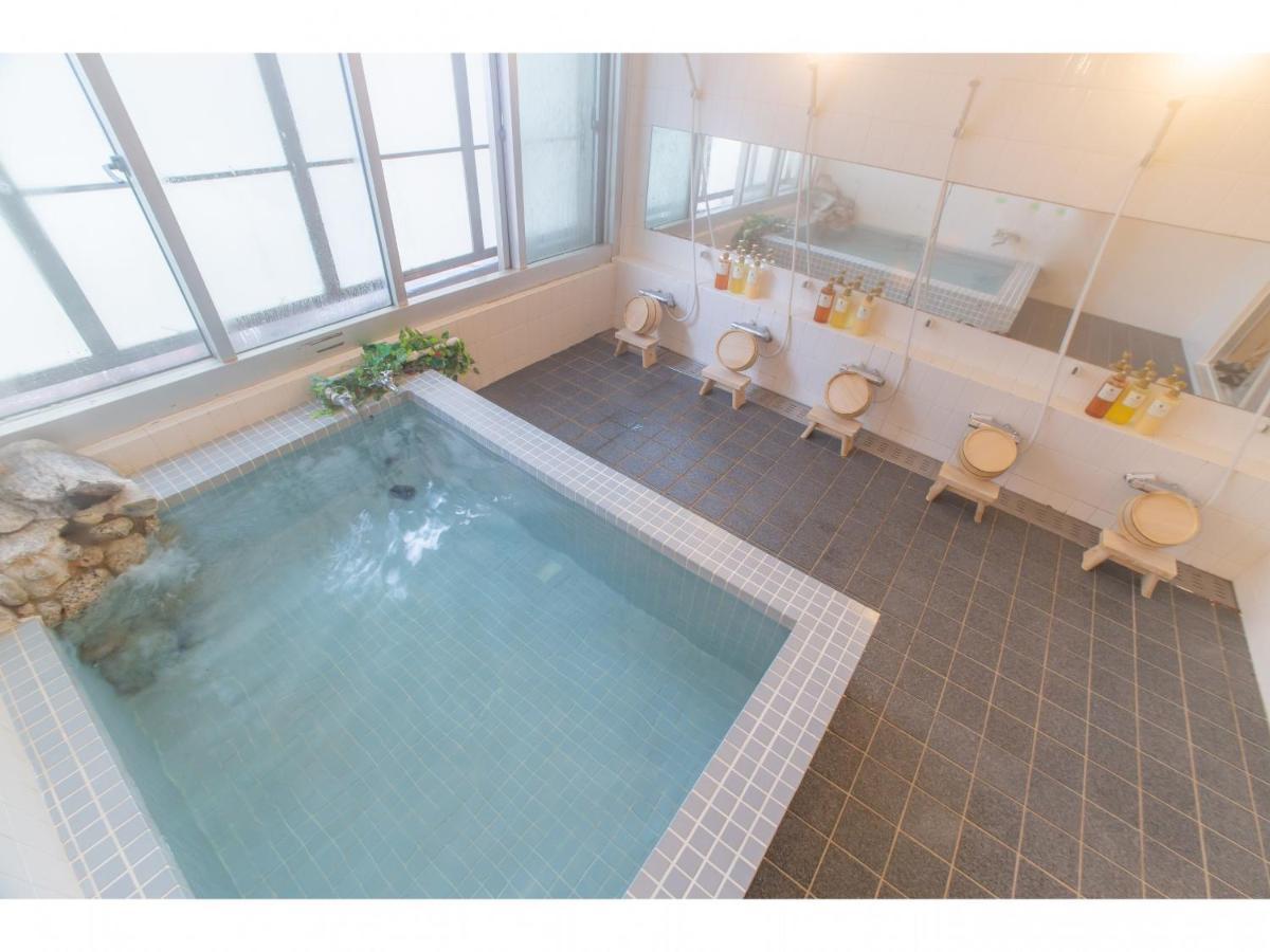 Nomad Hakuba Bed & Breakfast Exterior photo